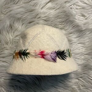 Elegant Vintage Cream Hat with Multicolor Feather Trim, purchased in Switzerland